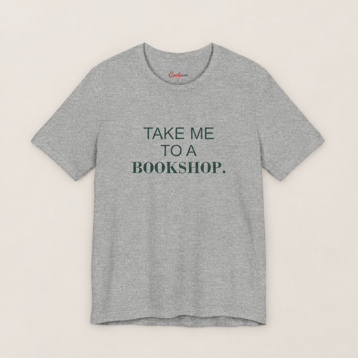 TAKE ME TO A BOOKSHOP. Bella+Canvas3001 T-shirt in Athletic Heather, front flat lay.