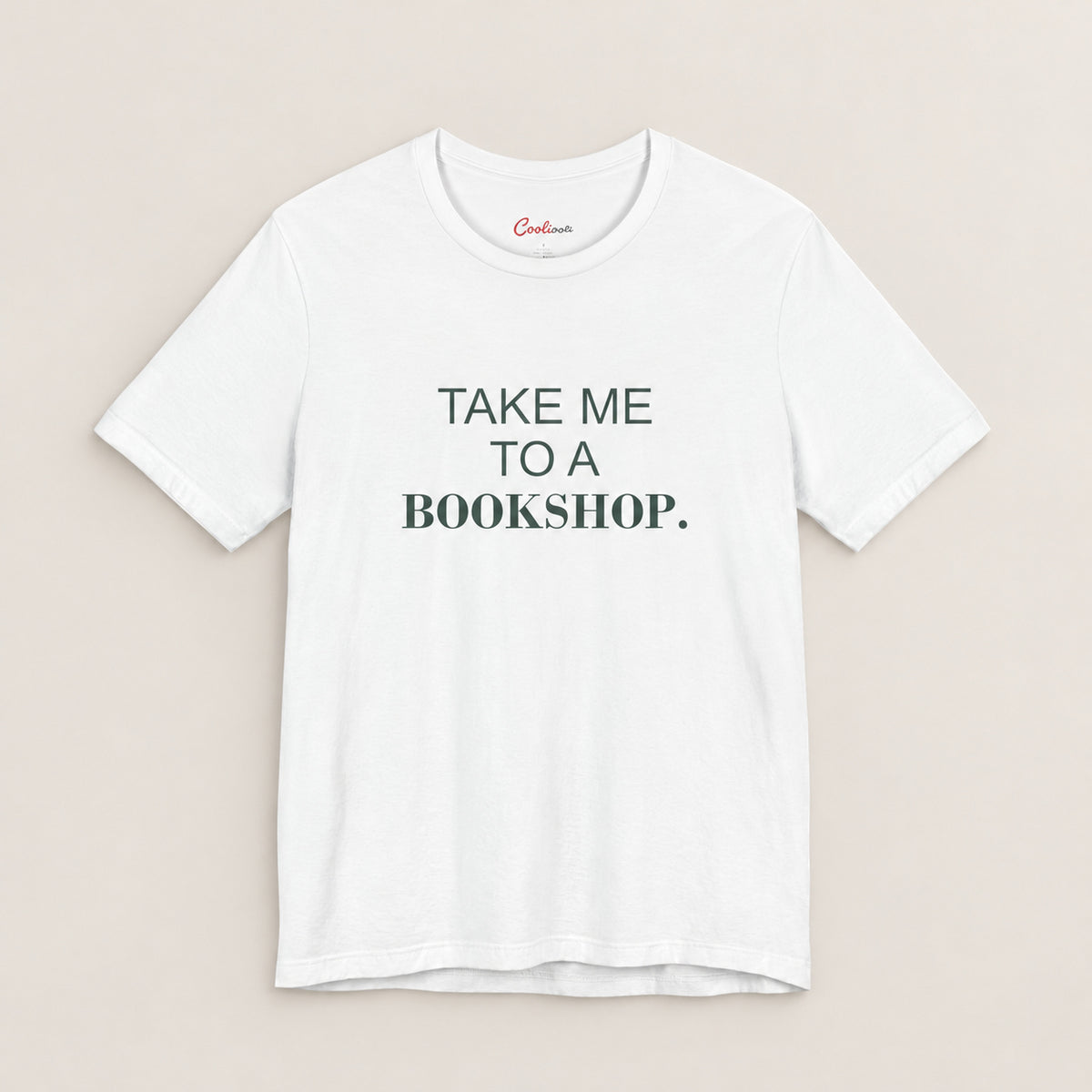 TAKE ME TO A BOOKSHOP. Bella+Canvas3001 T-shirt in White, front flat lay.