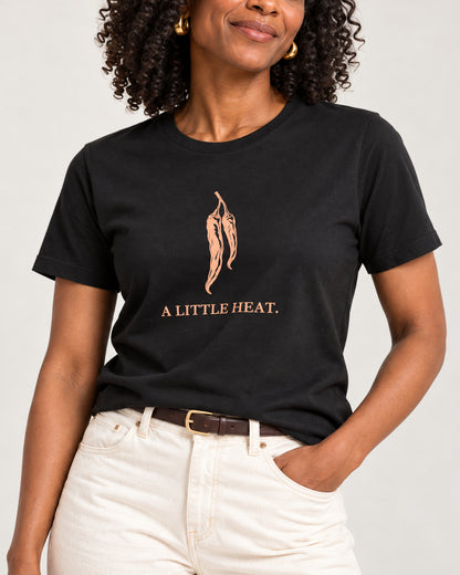 Matching collar-to-hip detail of Black Bella+Canvas3001, showing the exact A LITTLE HEAT. print and jersey.