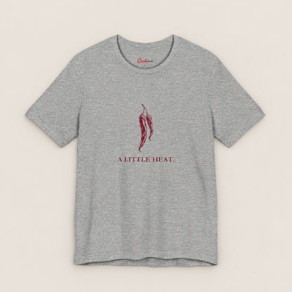 A LITTLE HEAT. Bella+Canvas3001 T-shirt in Athletic Heather, front flat lay.