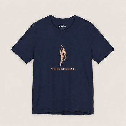 A LITTLE HEAT. Bella+Canvas3001 T-shirt in Navy, front flat lay.