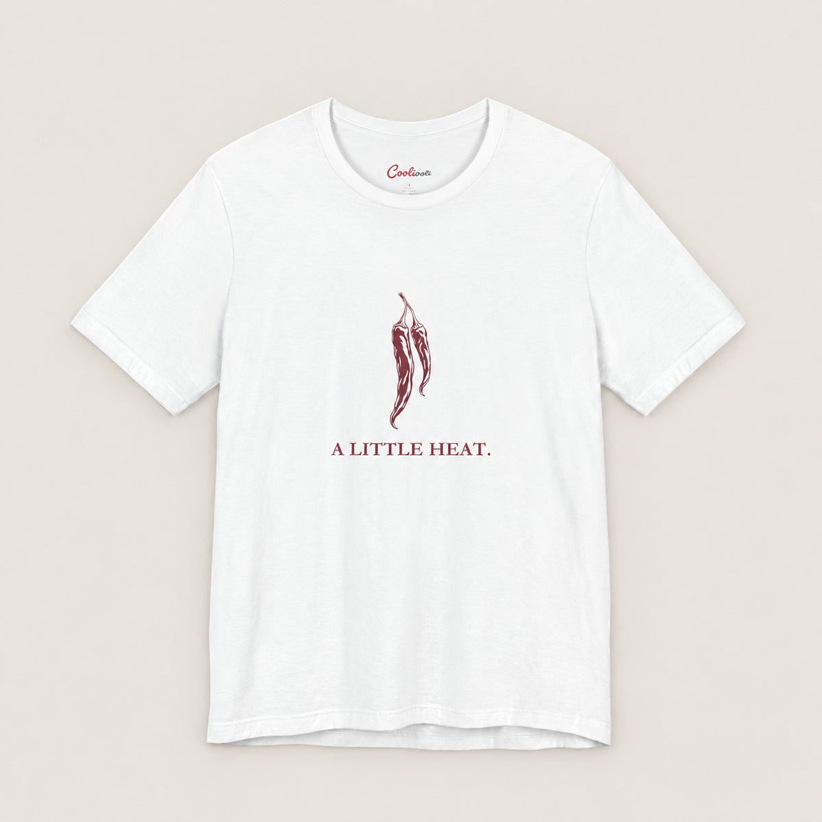 A LITTLE HEAT. Bella+Canvas3001 T-shirt in White, front flat lay.