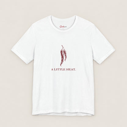 A LITTLE HEAT. Bella+Canvas3001 T-shirt in White, front flat lay.