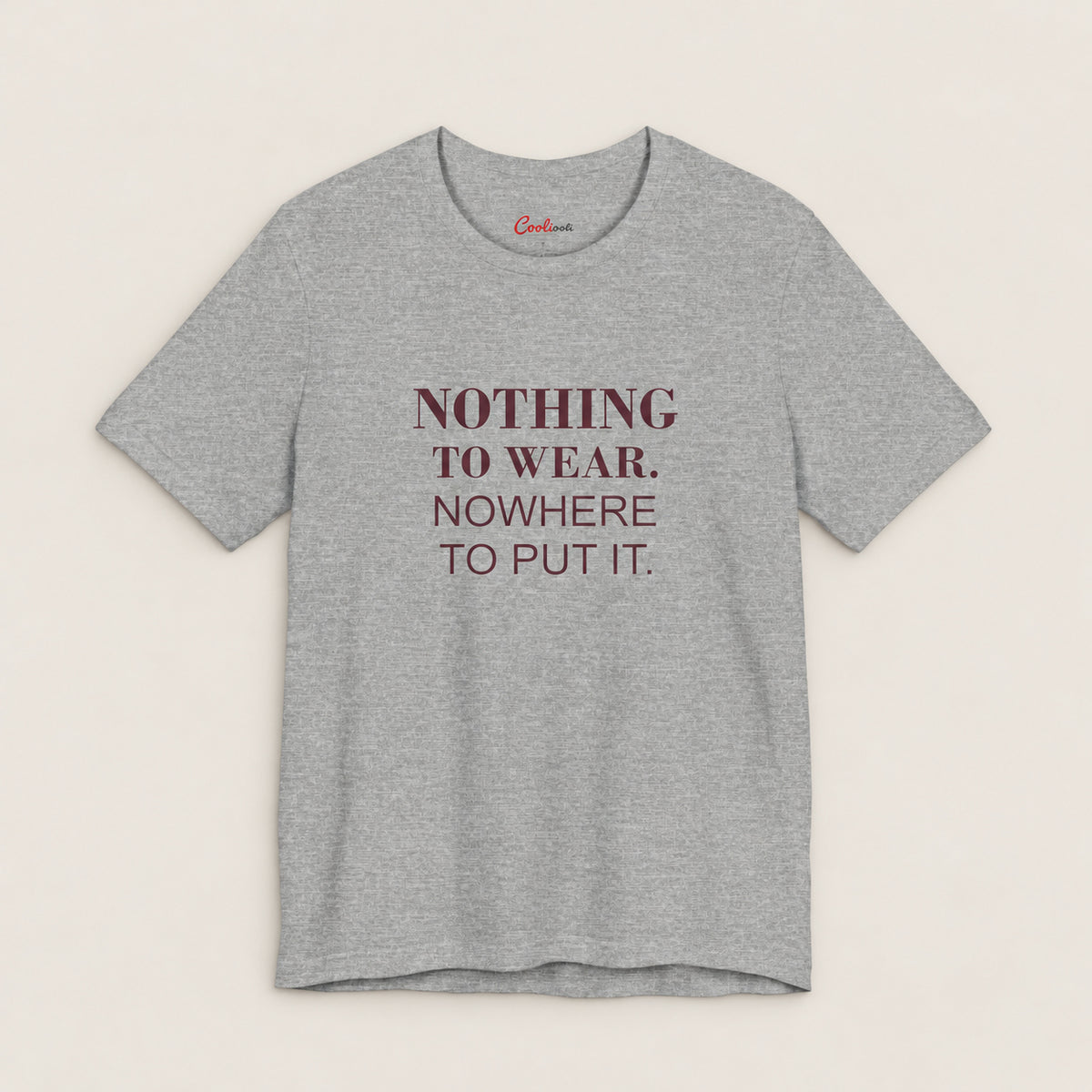 NOTHING TO WEAR. NOWHERE TO PUT IT. Bella+Canvas3001 T-shirt in Athletic Heather, front flat lay.