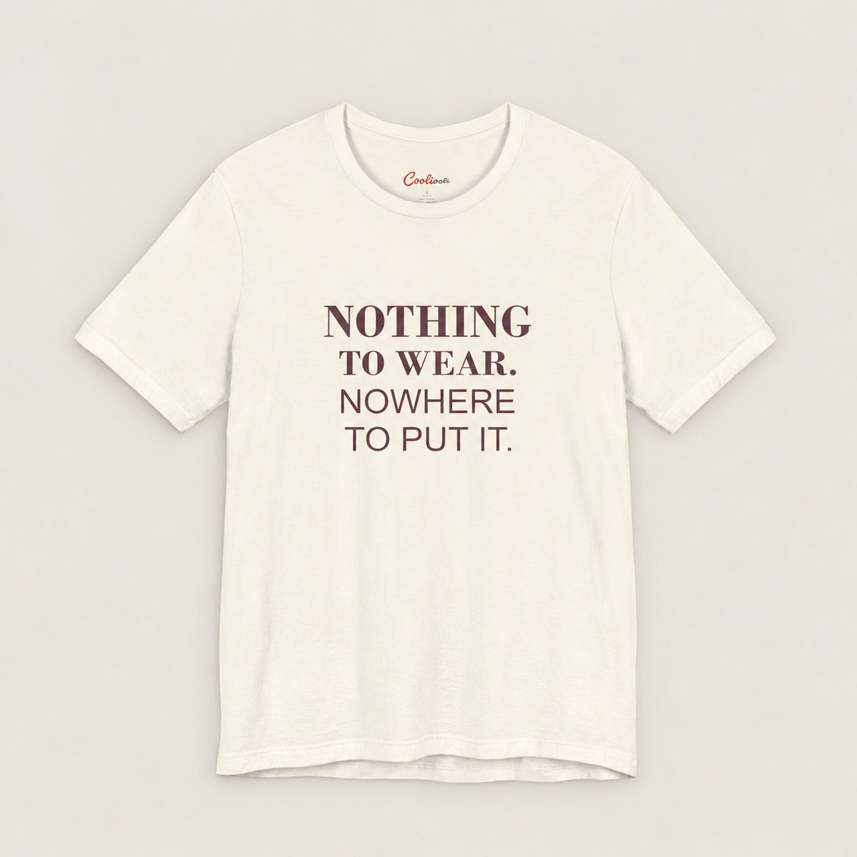 NOTHING TO WEAR. NOWHERE TO PUT IT. Bella+Canvas3001 T-shirt in Natural, front flat lay.