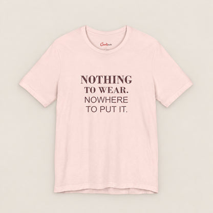NOTHING TO WEAR. NOWHERE TO PUT IT. Bella+Canvas3001 T-shirt in Soft Pink, front flat lay.