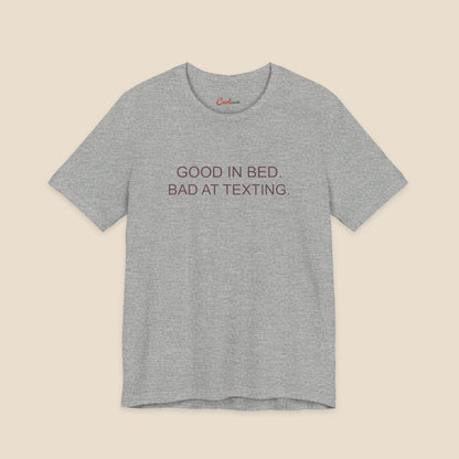Athletic Heather Good In Bed Bad At Texting Bella+Canvas 3001 tee, full flat lay