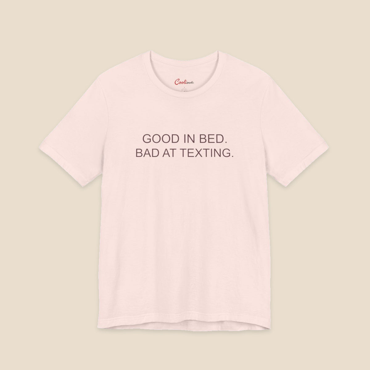Soft Pink Good In Bed Bad At Texting Bella+Canvas 3001 tee, full flat lay