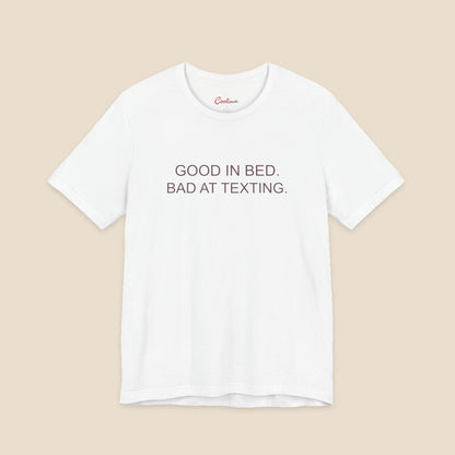 White Good In Bed Bad At Texting Bella+Canvas 3001 tee, full flat lay