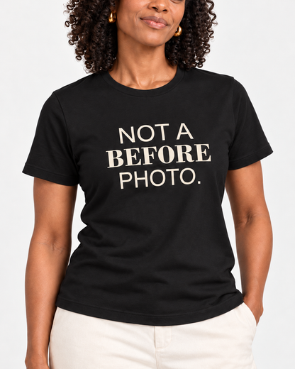Amara wearing the Black NOT A BEFORE PHOTO. Bella+Canvas 3001 tee — collar-to-hip print detail