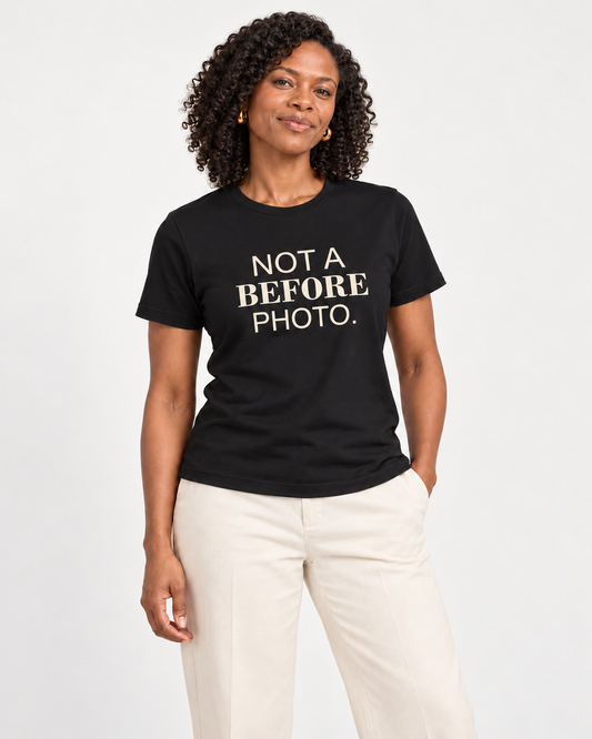 Amara wearing the Black NOT A BEFORE PHOTO. Bella+Canvas 3001 tee in a natural studio portrait