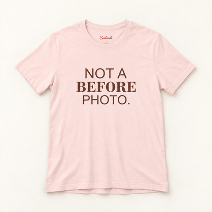 NOT A BEFORE PHOTO. Bella+Canvas 3001 tee in Soft Pink, overhead view on a plain warm neutral studio background