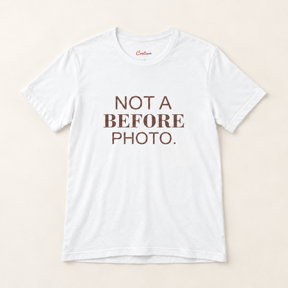 NOT A BEFORE PHOTO. Bella+Canvas 3001 tee in White, overhead view on a plain warm neutral studio background