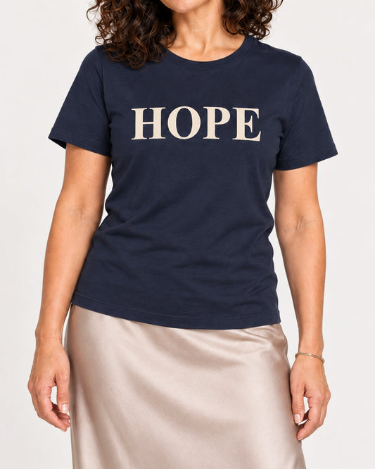 Leila wearing the Navy Better Days Look Good on You. Bella+Canvas 3001 tee — collar-to-hip detail