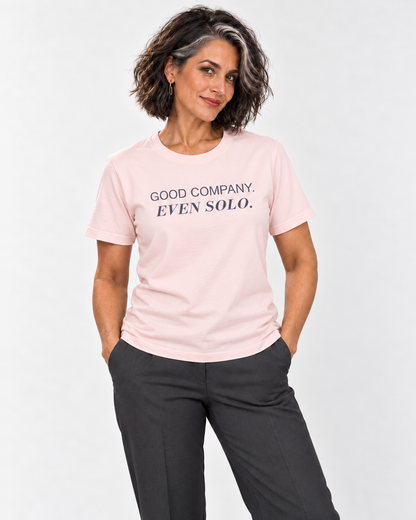 Freya wearing the Soft Pink GOOD COMPANY. EVEN SOLO. Bella+Canvas 3001 tee in a natural studio portrait