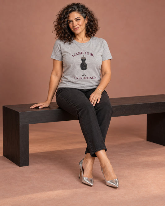 Leila wearing the Athletic Heather The Dress Code Was Clearly a Suggestion. Bella+Canvas crew-neck tee in a styled professional studio photograph