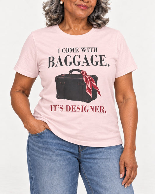 Vivienne wearing the Soft Pink Excess Baggage. Excellent Taste. Bella+Canvas 3001 tee — collar-to-hip detail