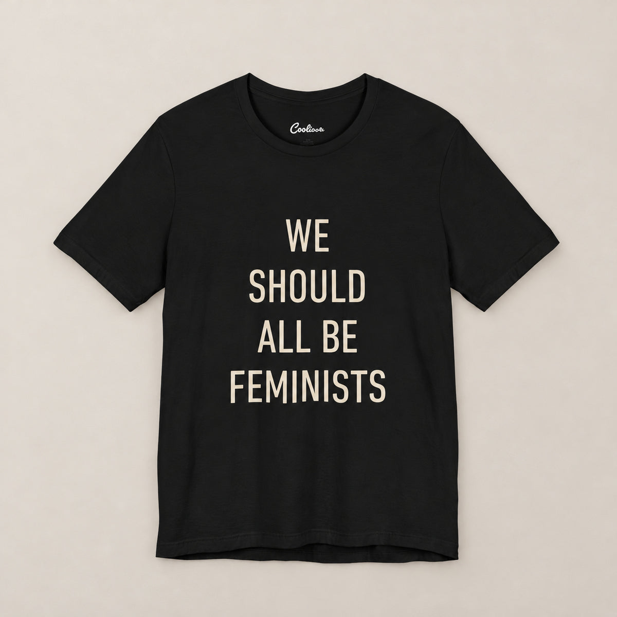 We Should All Be Feminists Bella+Canvas 3001 T-shirt in Black, front flat lay.