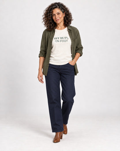 Leila wearing the Natural OFF DUTY. ON FOOT. Bella+Canvas 3001 tee — full-length natural studio outfit