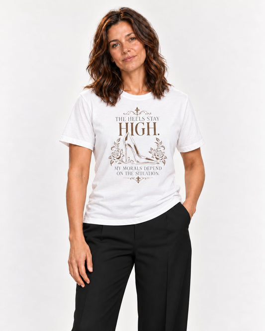 Sophie wearing the White Firm on the Footwear. Flexible on the Rest. Bella+Canvas 3001 tee — natural studio portrait