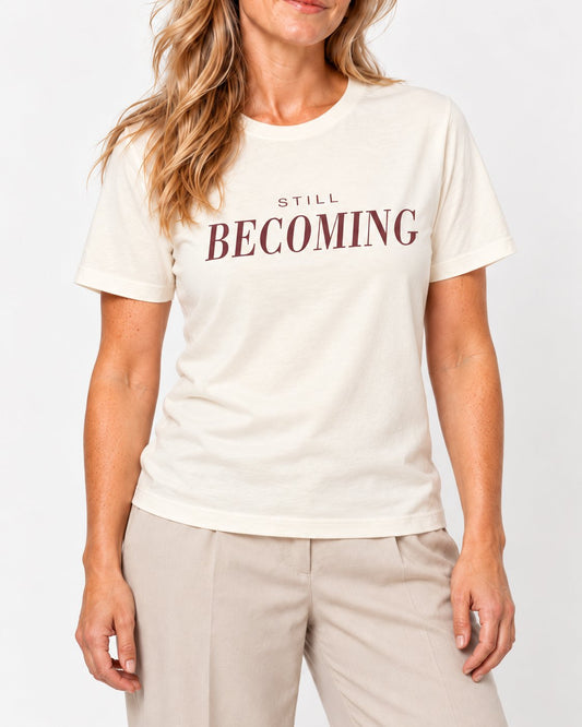 Elena wearing the Natural Her Best Chapter Is Still Ahead. Bella+Canvas 3001 tee — collar-to-hip detail