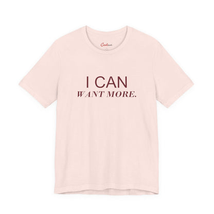 I CAN WANT MORE. Bella+Canvas 3001 tee in Soft Pink, neat overhead front view