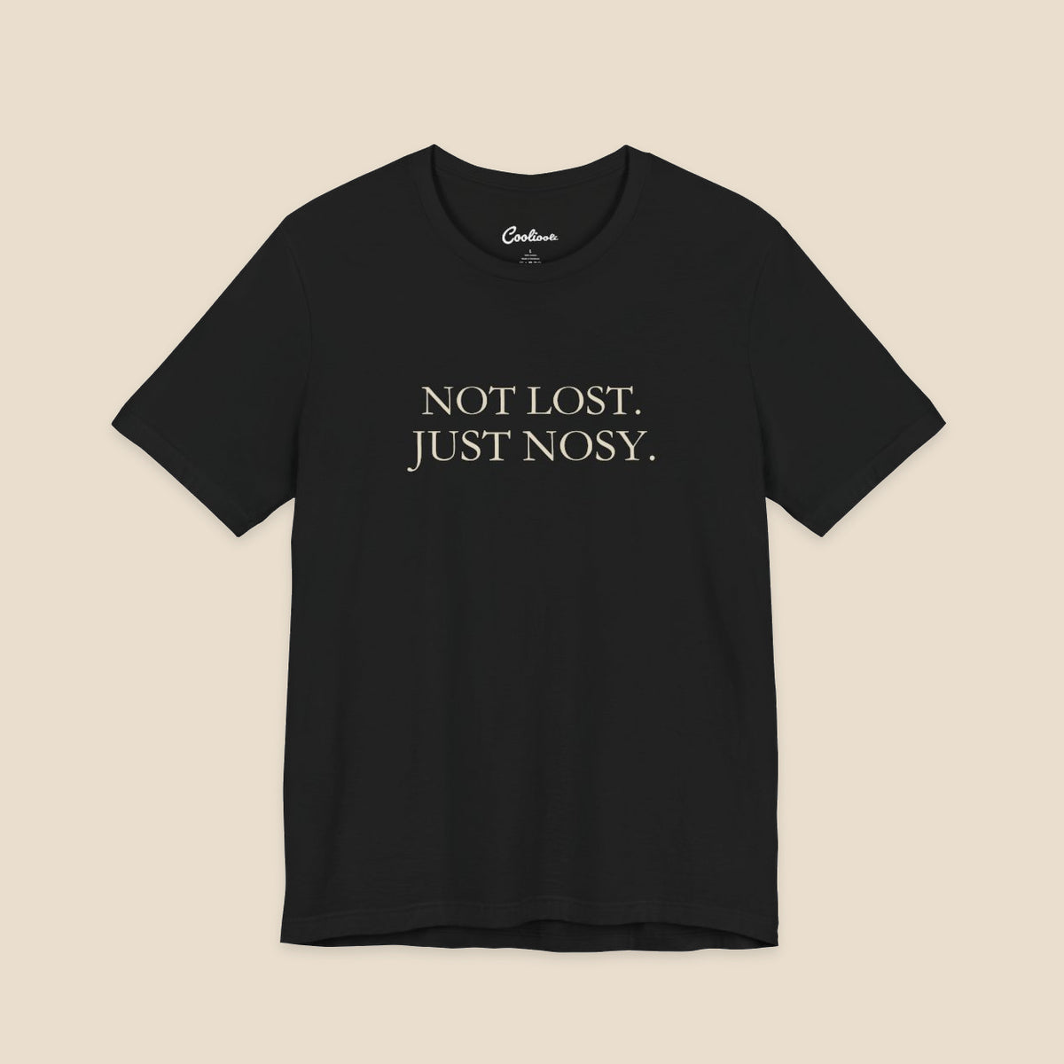 Black Bella+Canvas3001 T-shirt with the two-line Not Lost. Just Nosy. chest design.