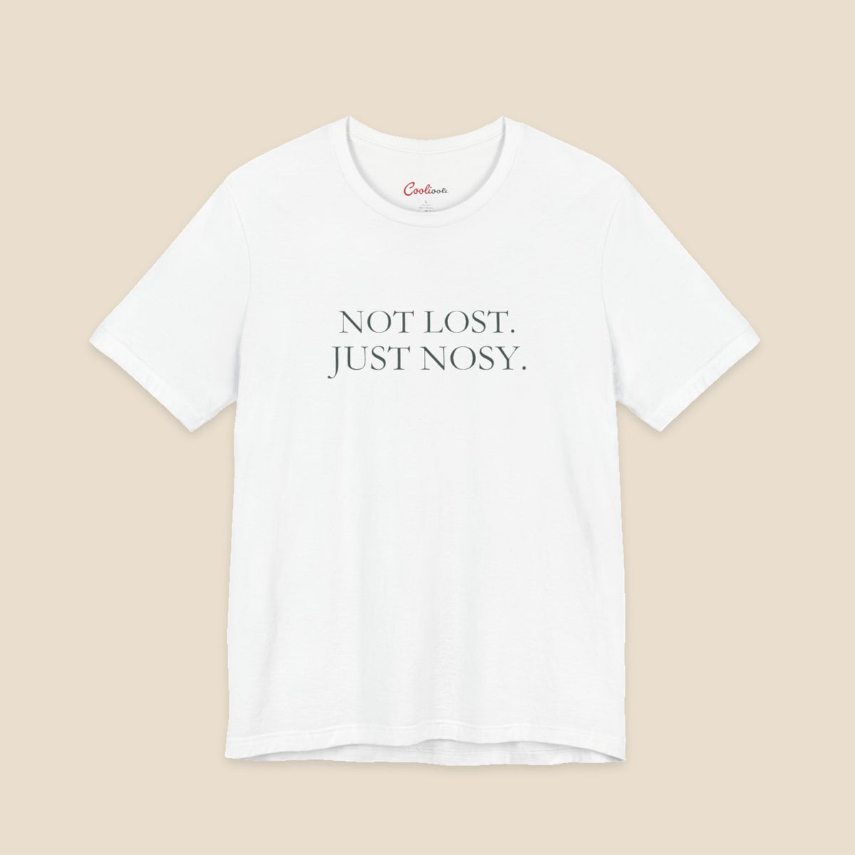 White Bella+Canvas3001 T-shirt with the two-line Not Lost. Just Nosy. chest design.