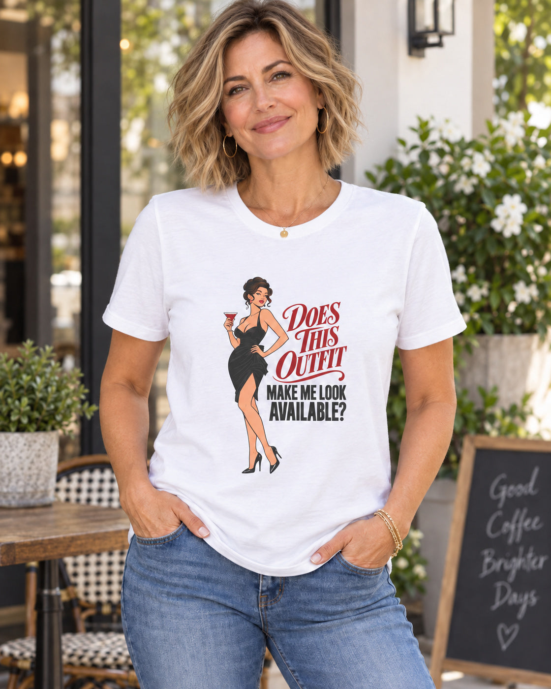 Woman with a messy blonde bob wearing the white Does This Outfit Make Me Look Available T-shirt