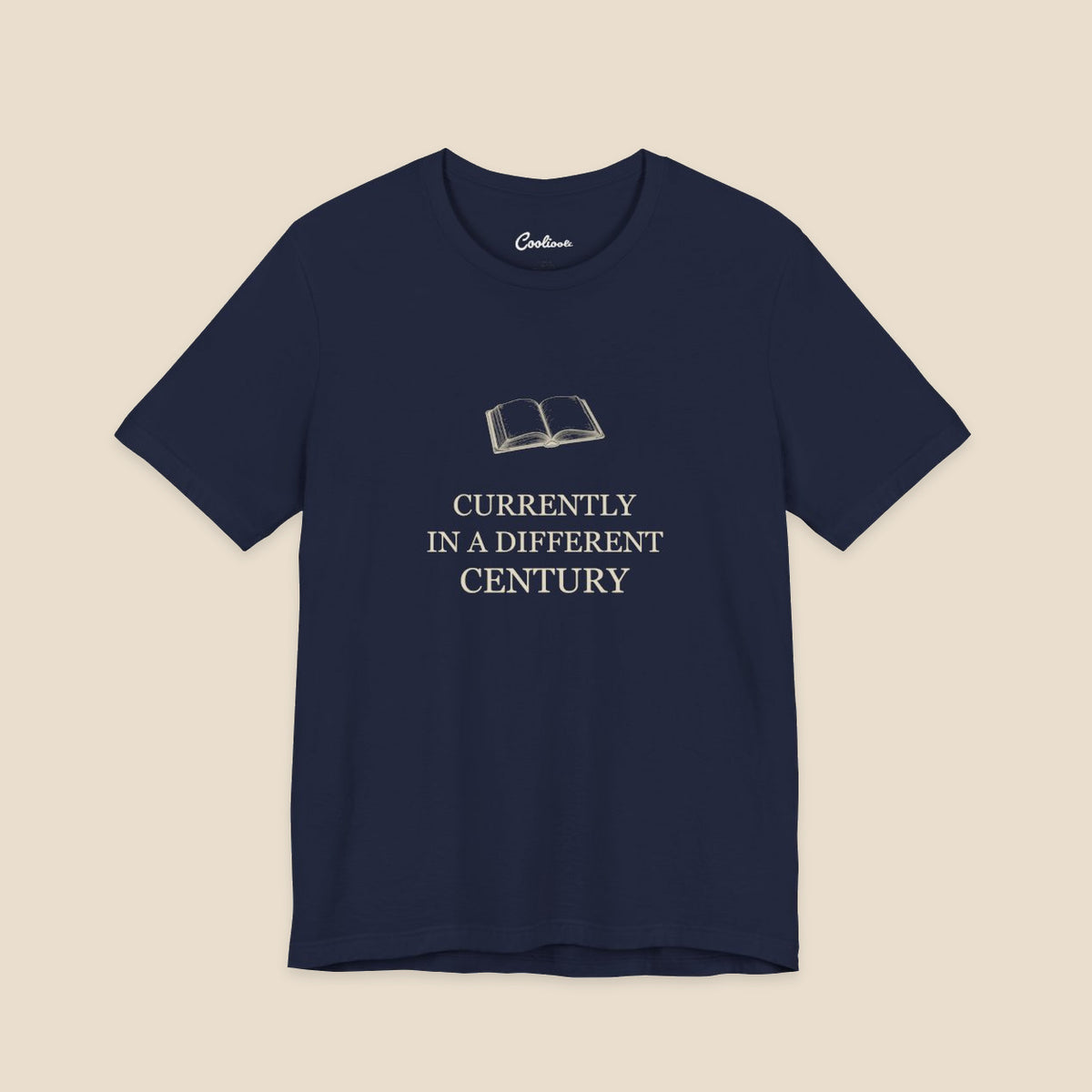 Navy Bella+Canvas 3001 reader T-shirt with an original open-book illustration and Currently in a Different Century lettering.