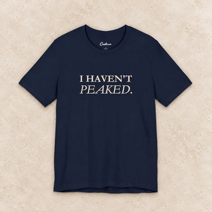 I Haven't Peaked Bella+Canvas 3001 T-shirt in Navy, front flat lay.