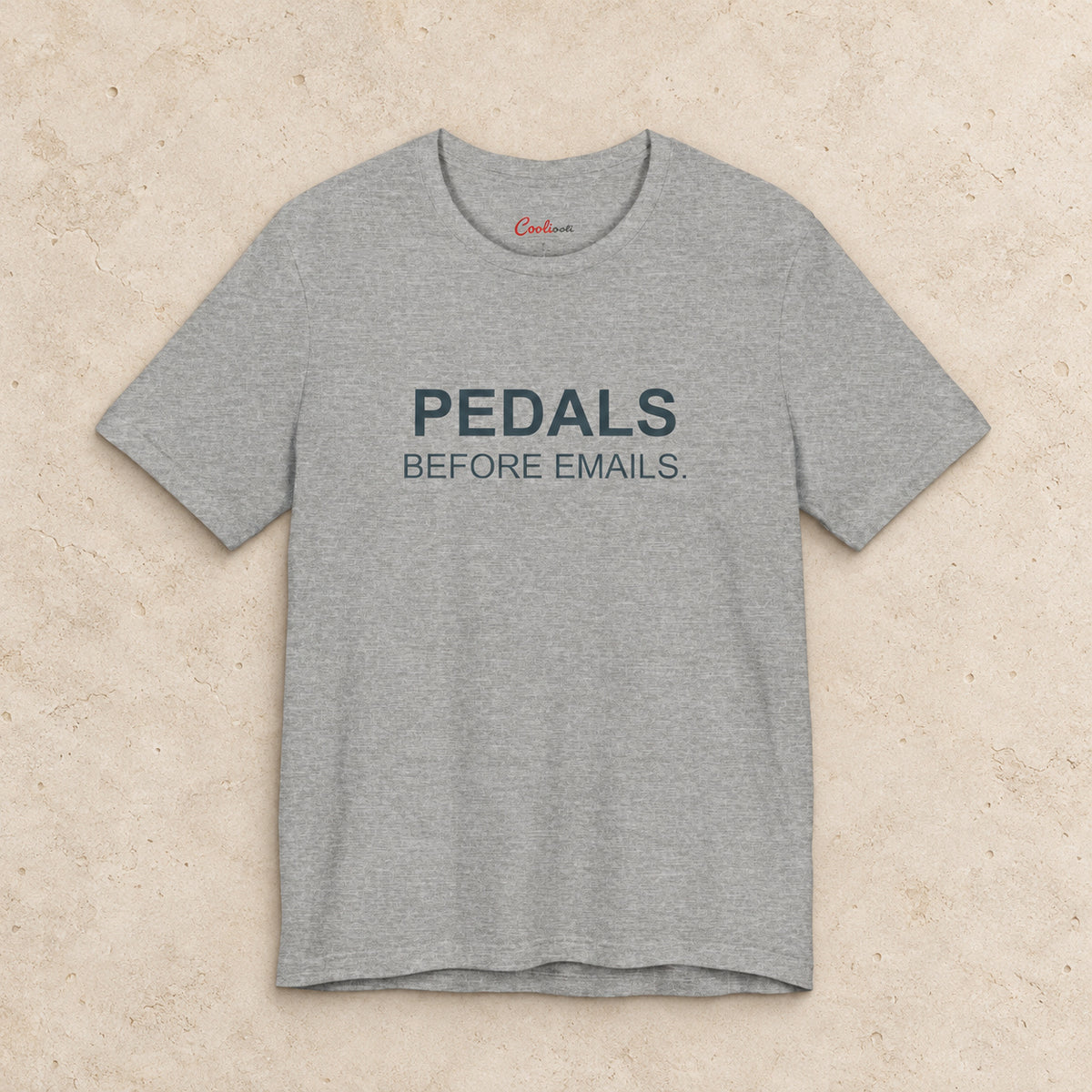 Pedals Before Emails. Bella+Canvas3001 T-shirt in Athletic Heather, front flat lay.