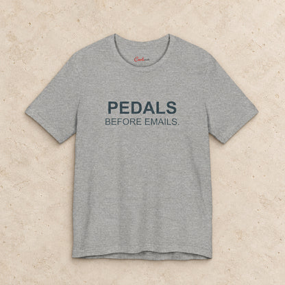 Pedals Before Emails. Bella+Canvas3001 T-shirt in Athletic Heather, front flat lay.