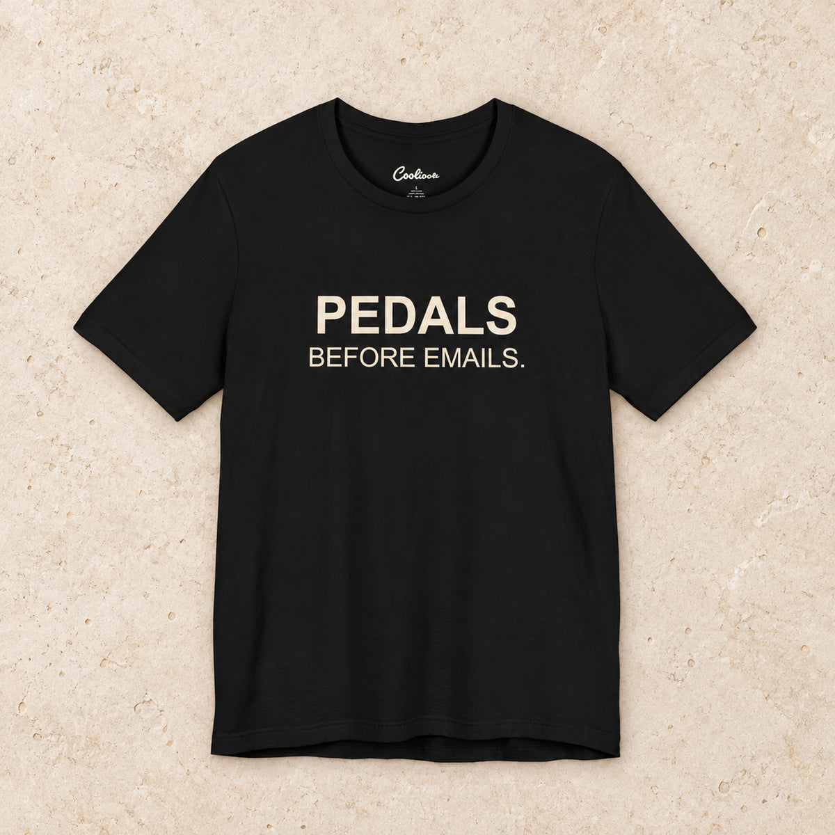 Pedals Before Emails. Bella+Canvas3001 T-shirt in Black, front flat lay.