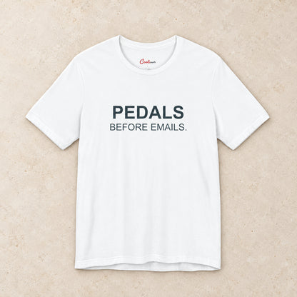 Pedals Before Emails. Bella+Canvas3001 T-shirt in White, front flat lay.