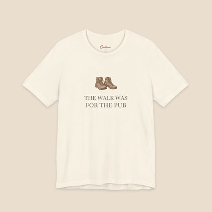 Natural Bella+Canvas3001 T-shirt with a brown hiking boots graphic and The Walk Was for the Pub serif lettering.