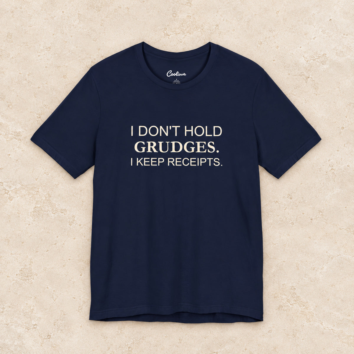 I Don't Hold Grudges. I Keep Receipts. Bella+Canvas3001 T-shirt in Navy, front flat lay.