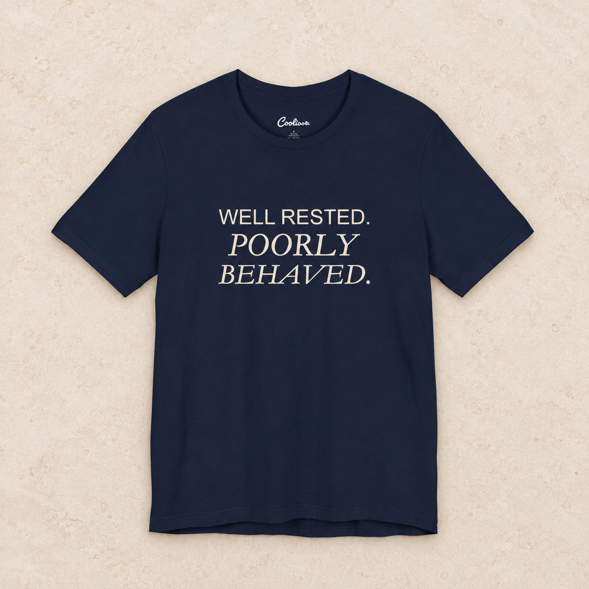 WELL RESTED. POORLY BEHAVED. Bella+Canvas3001 T-shirt in Navy, front flat lay.