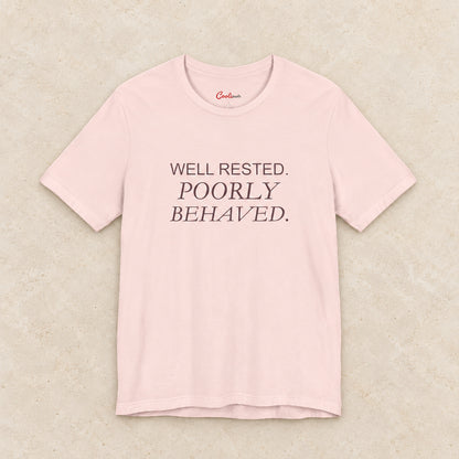 WELL RESTED. POORLY BEHAVED. Bella+Canvas3001 T-shirt in Soft Pink, front flat lay.