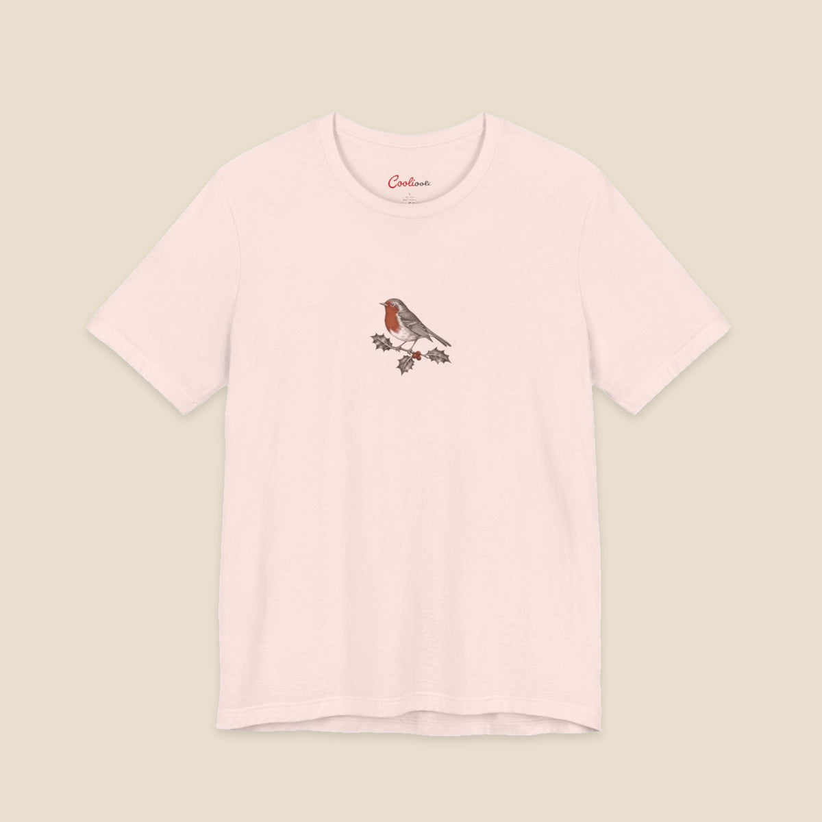 Soft Pink Bella+Canvas3001 Christmas T-shirt with an original small robin and holly illustration, no lettering.