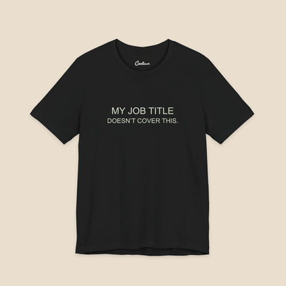 Black Bella+Canvas 3001 work humour T-shirt with two-line My Job Title Doesn’t Cover This lettering.
