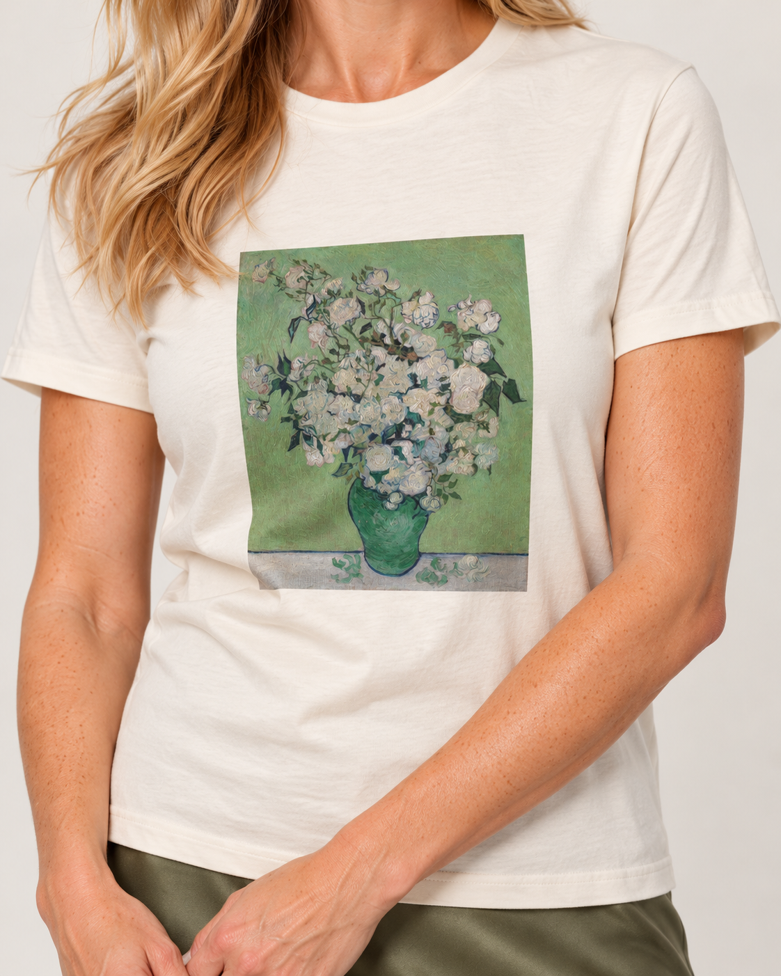 Close-up of the Natural Roses T-shirt showing the matte floral print following the cotton fold.