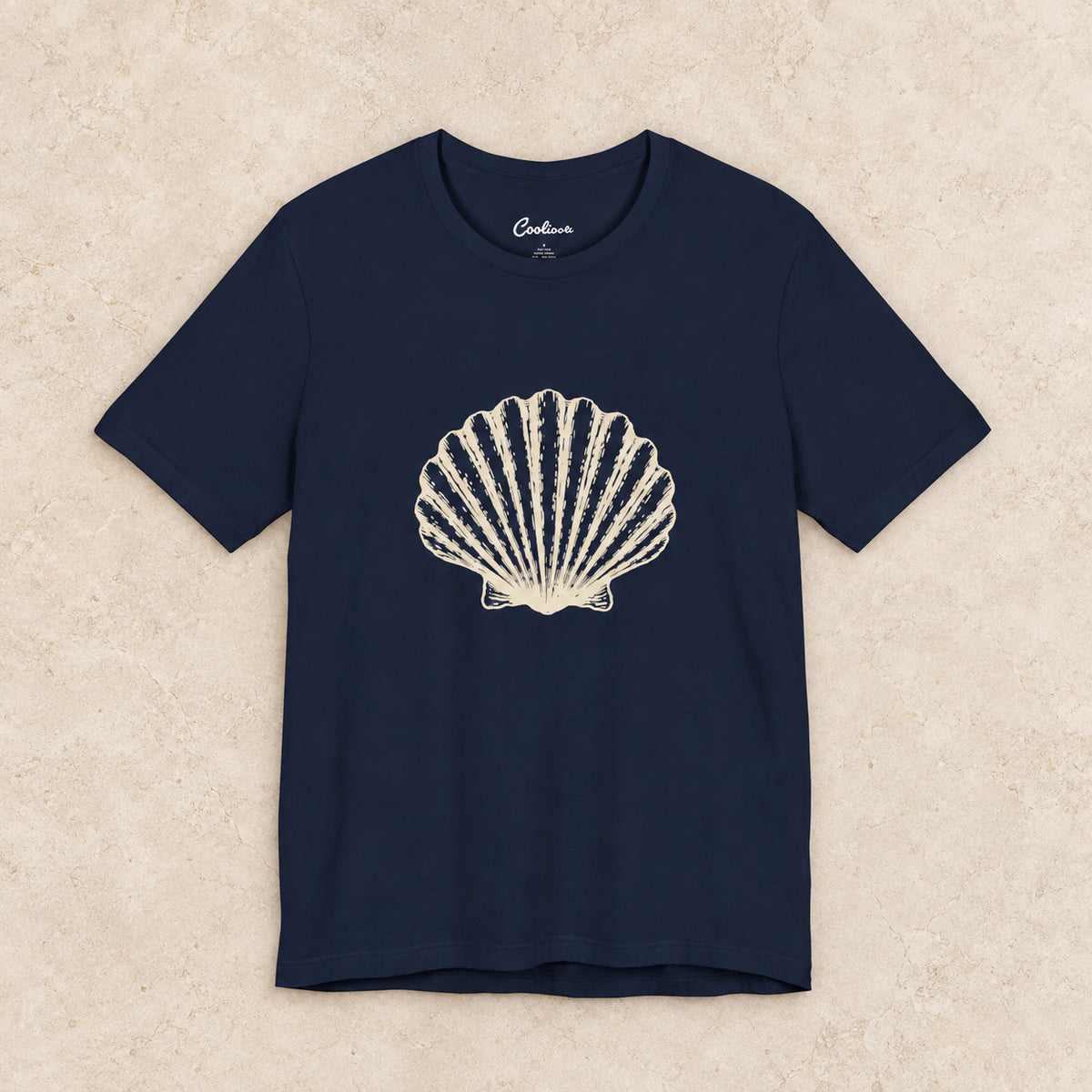 Original scallop shell Bella+Canvas3001 T-shirt in Navy, front flat lay.