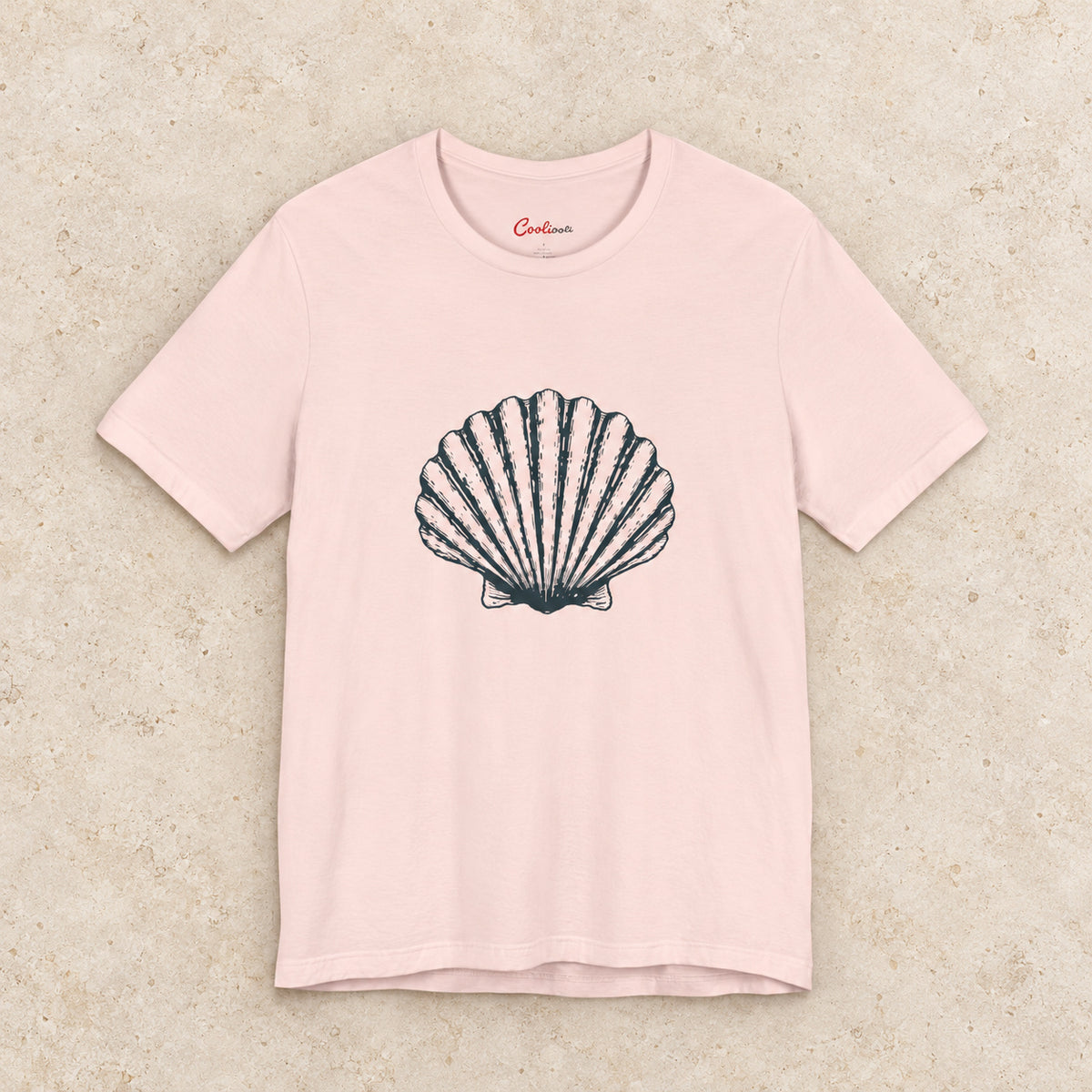 Original scallop shell Bella+Canvas3001 T-shirt in Soft Pink, front flat lay.