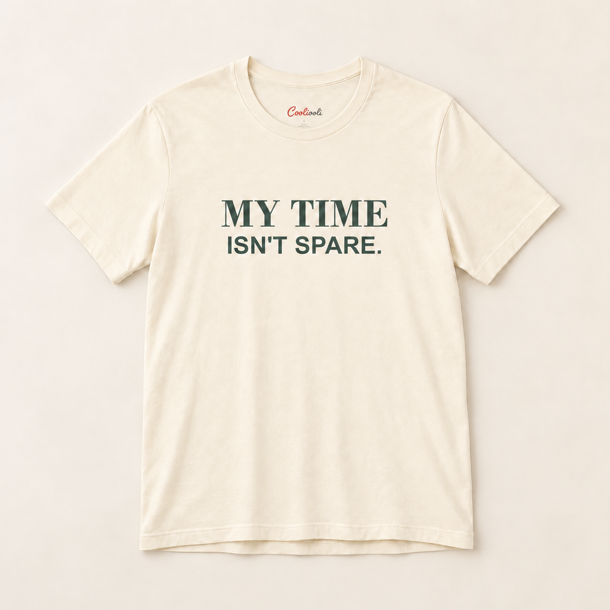 MY TIME ISN'T SPARE. Bella+Canvas 3001 tee in Natural, overhead view on a plain warm neutral studio background
