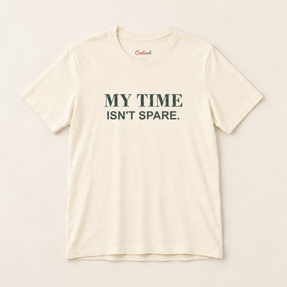 MY TIME ISN'T SPARE. Bella+Canvas 3001 tee in Natural, overhead view on a plain warm neutral studio background