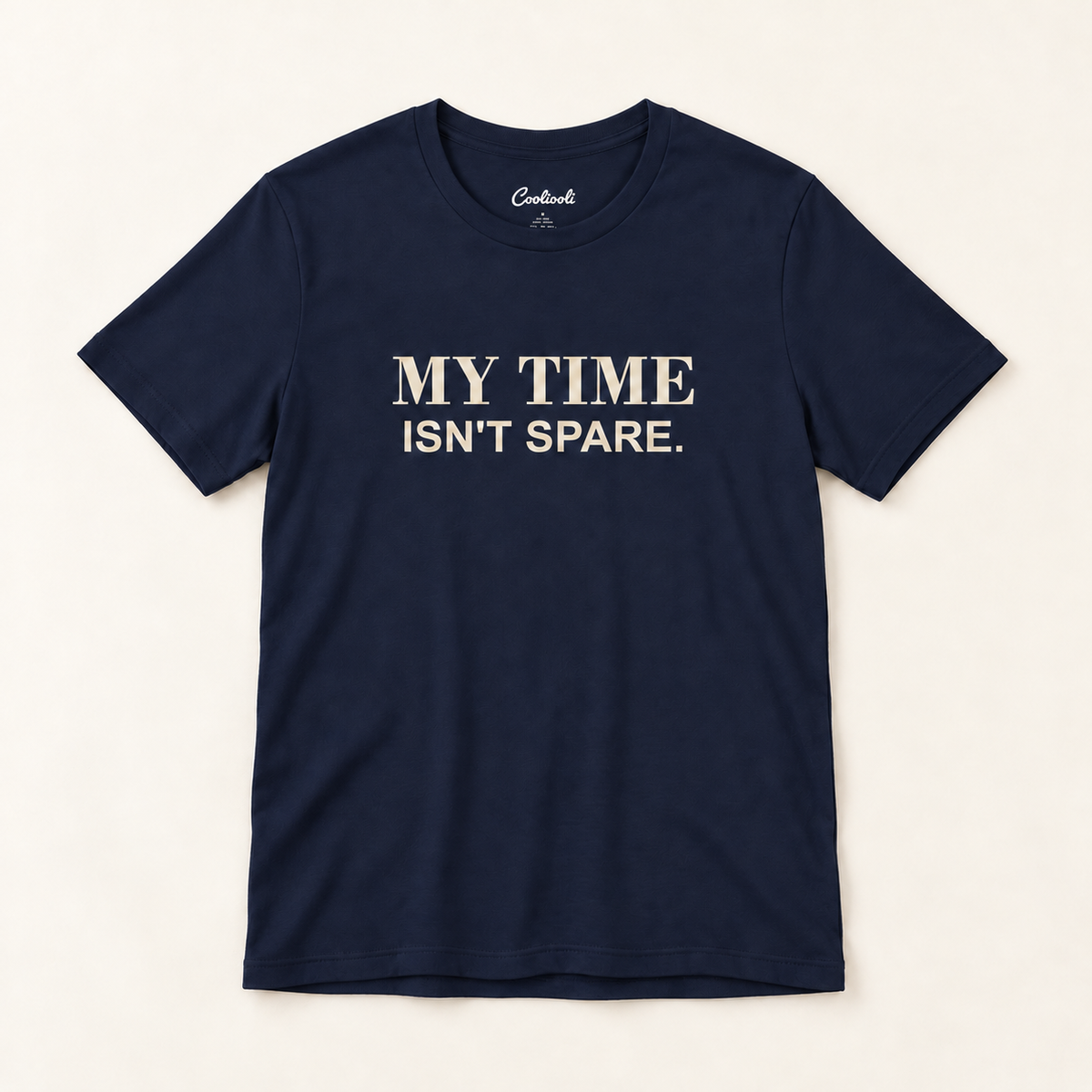 MY TIME ISN'T SPARE. Bella+Canvas 3001 tee in Navy, overhead view on a plain warm neutral studio background
