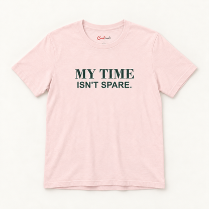 MY TIME ISN'T SPARE. Bella+Canvas 3001 tee in Soft Pink, overhead view on a plain warm neutral studio background