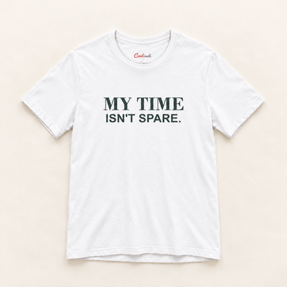 MY TIME ISN'T SPARE. Bella+Canvas 3001 tee in White, overhead view on a plain warm neutral studio background
