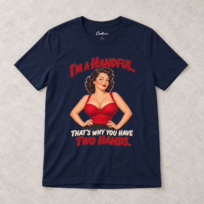 Navy Cooliooli T-shirt with the “I’m a handful. That’s why you have two hands.” pin-up design, front flat lay